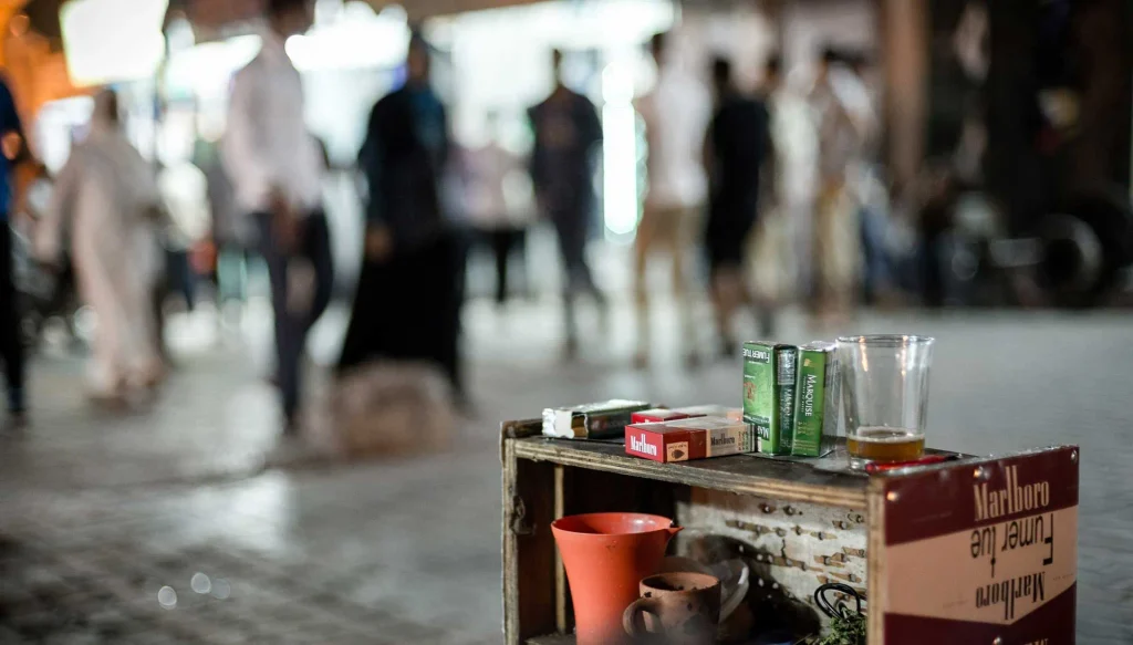 Cigarette seller at night in Ouarzazate – By A. Azizi