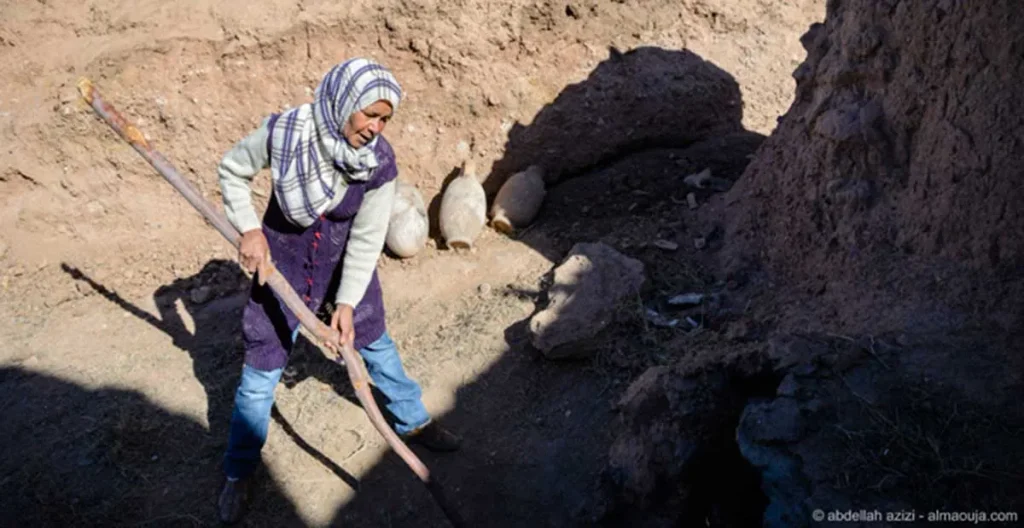 A woman at work making pottery in Skoura